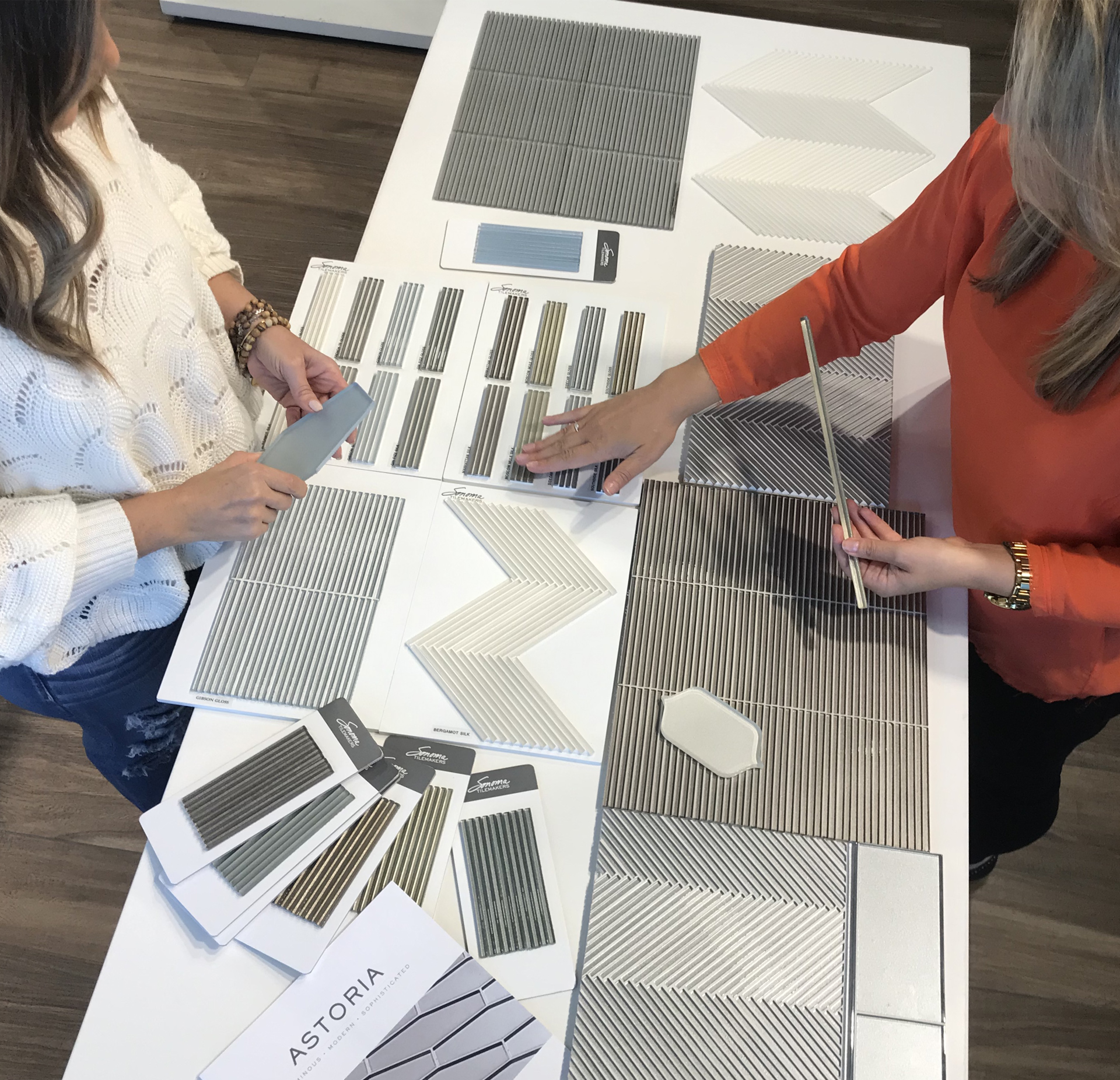 Tile America sales support staff consulting a project