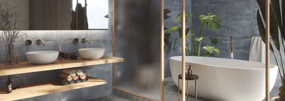 Deparisa zen inspired bathroom with freestanding tub and plants