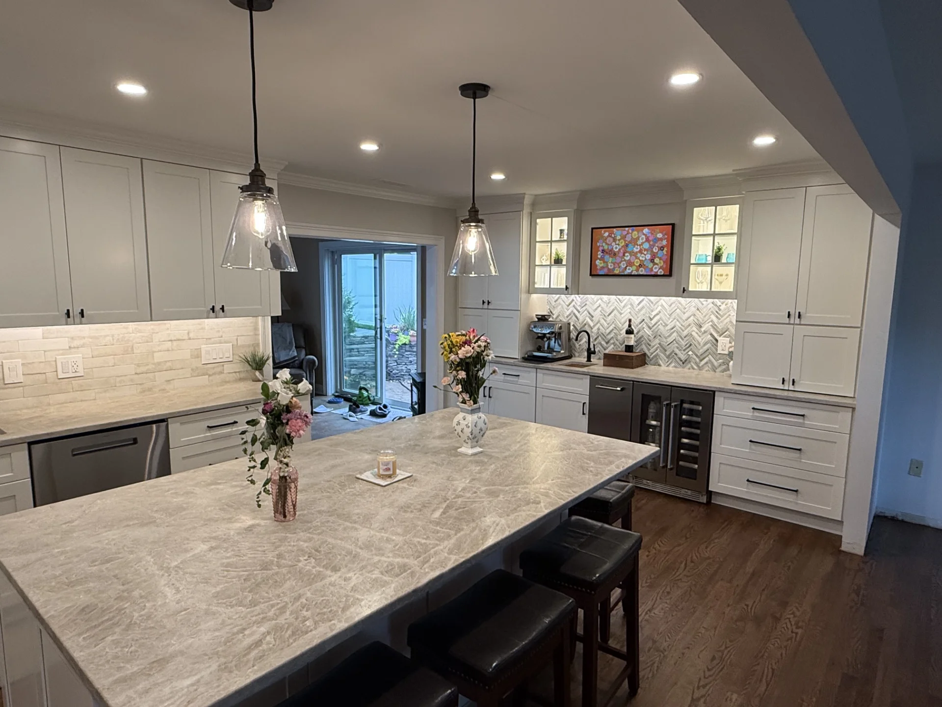 Craft Off-White Glossy Deco main backsplash and Agate Bari 1x4 Pearl Herringbone TV/Wet Bar wall
