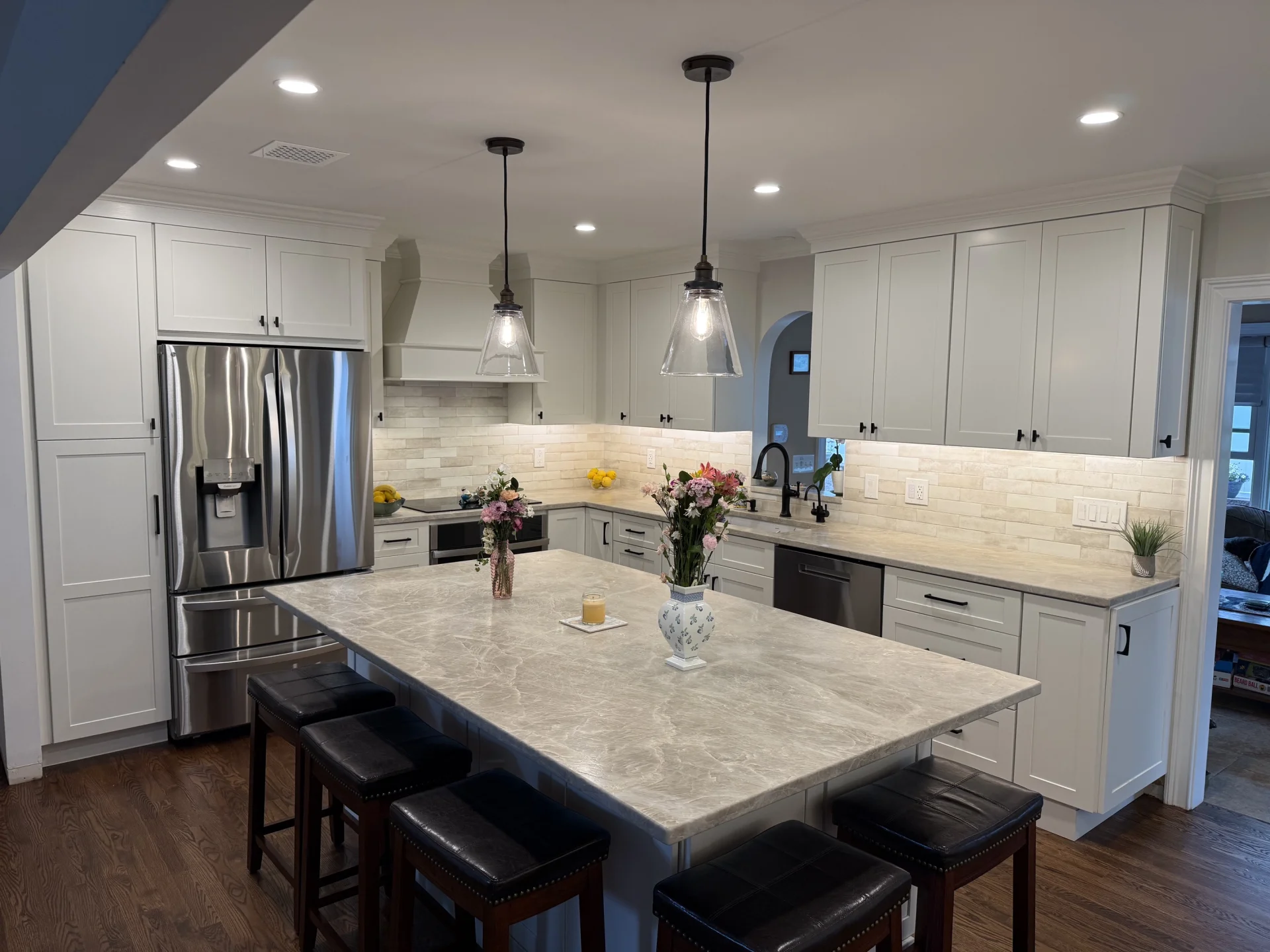 Craft Off-White Glossy Deco main backsplash and Agate Bari 1x4 Pearl Herringbone TV/Wet Bar wall