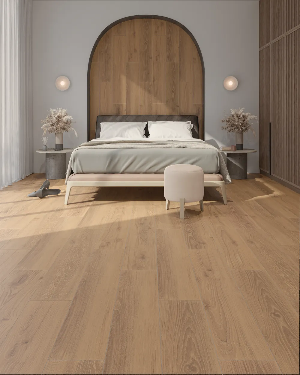 Modern bedroom featuring Forestal Roble golden oak wood-look porcelain plank flooring and a matching arched headboard feature wall.