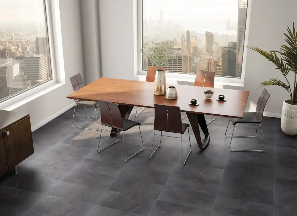 Contemporary room with a city view featuring St.Croix Flint large-format dark grey stone-look porcelain flooring.