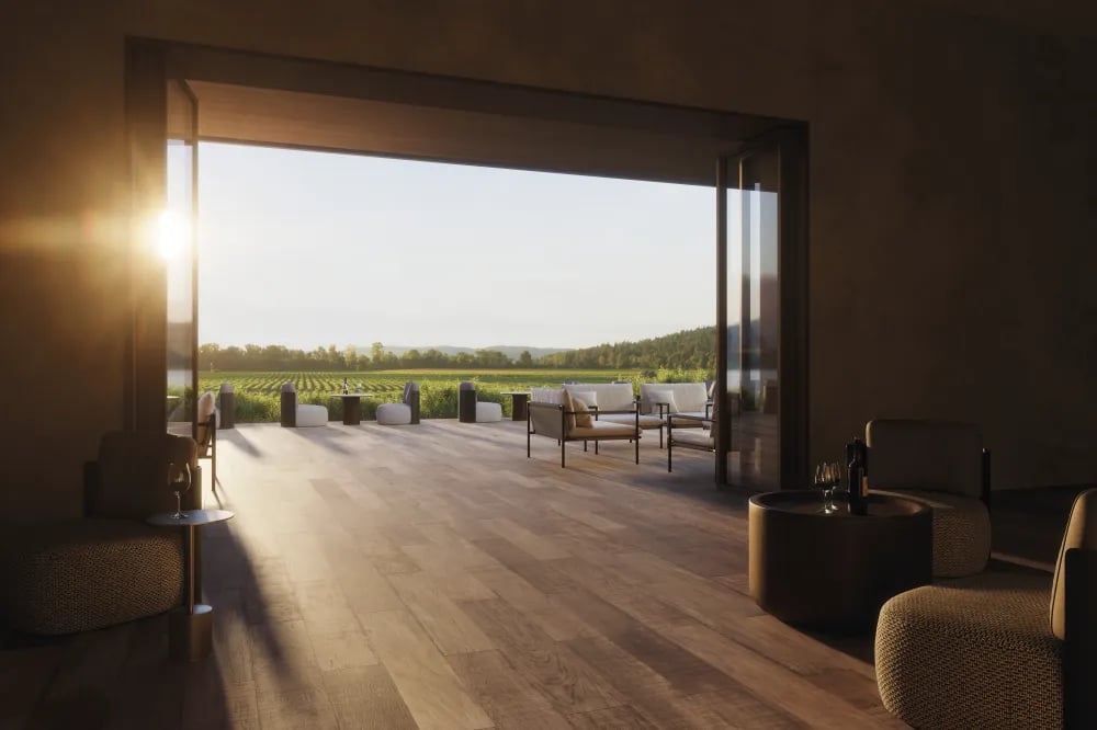 Indoor-outdoor vineyard lounge flooring featuring Arca Tropical 8x48 wood-look porcelain planks flowing onto a sunlit patio.