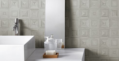 Bambusa tile collection in grey on backsplash with modern sink and mirror