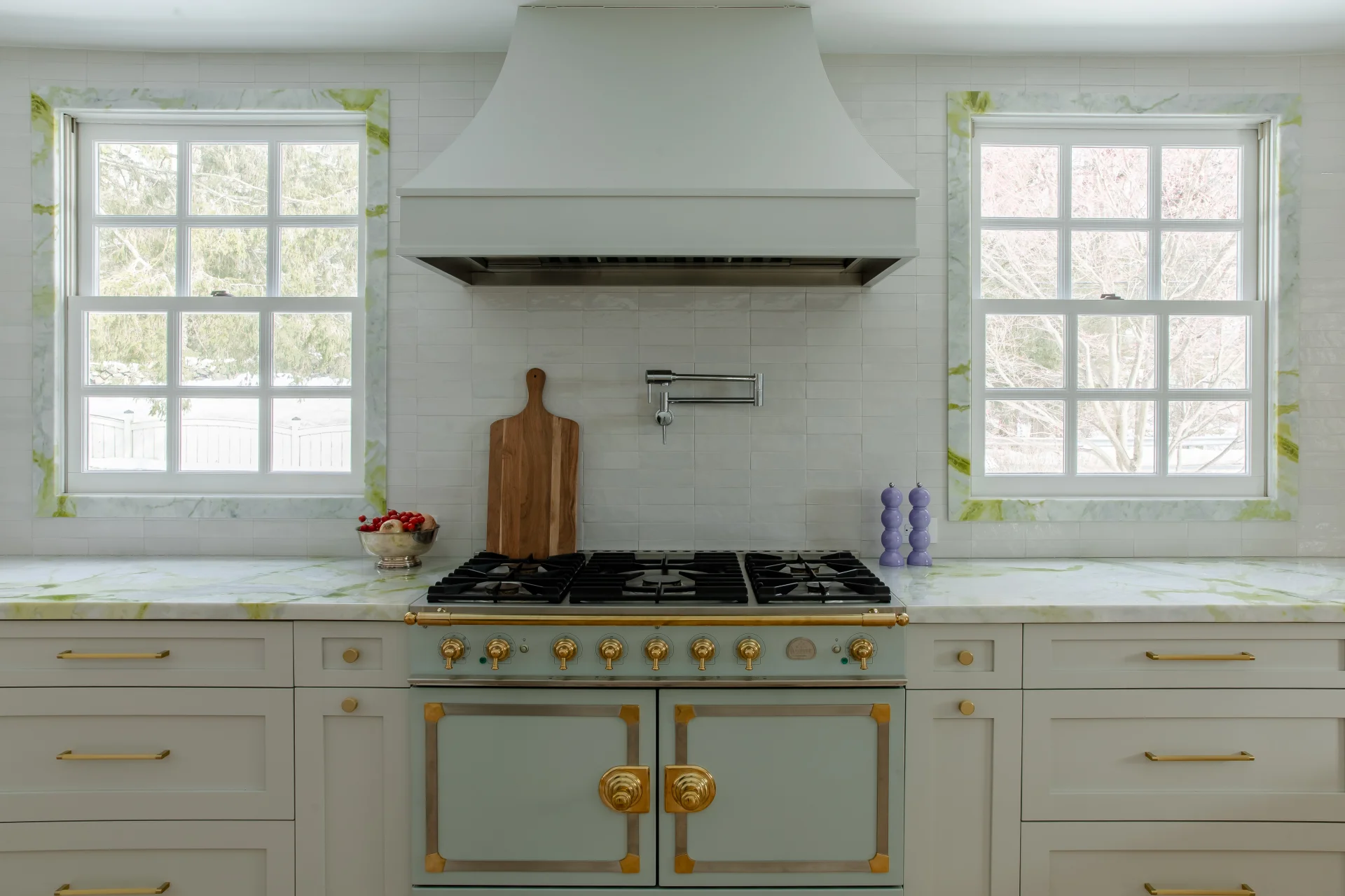 Retro Kitchen with marble counters with neon green vein accent by House of Huck shown in a real tile project.